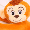 Peluche singe qui s'accroche