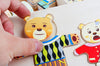 Puzzle en Bois de Changement de Vêtements pour la Famille Ours et Lapin