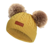 Bonnet en laine double pompon pour enfants
