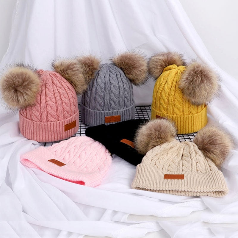 Bonnet en laine double pompon pour enfants