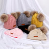 Bonnet en laine double pompon pour enfants