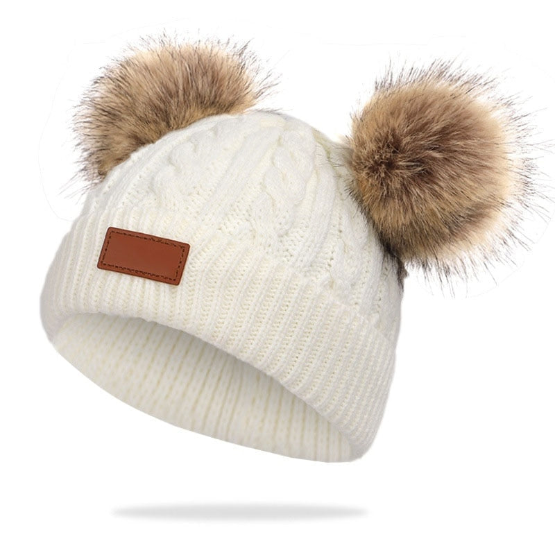 Bonnet en laine double pompon pour enfants