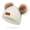 Bonnet en laine double pompon pour enfants
